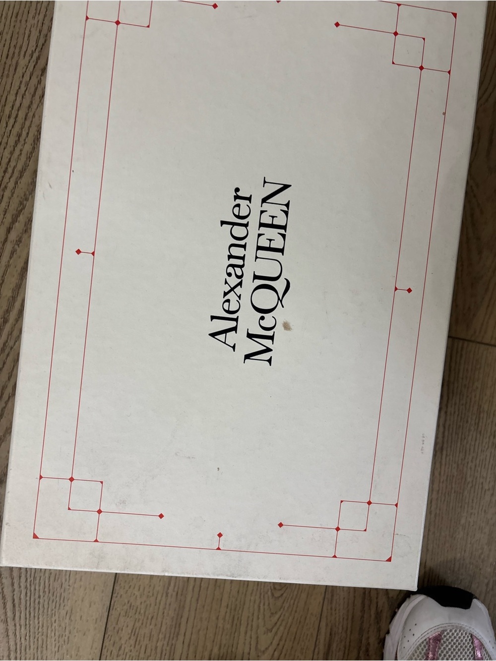 Alexander McQueen White Box with Red Border and Black Logo